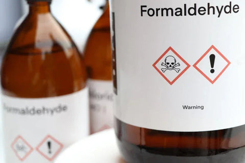 Formaldehyde warning labels on brown glass bottles, chemical safety, non-toxic hair extension supply